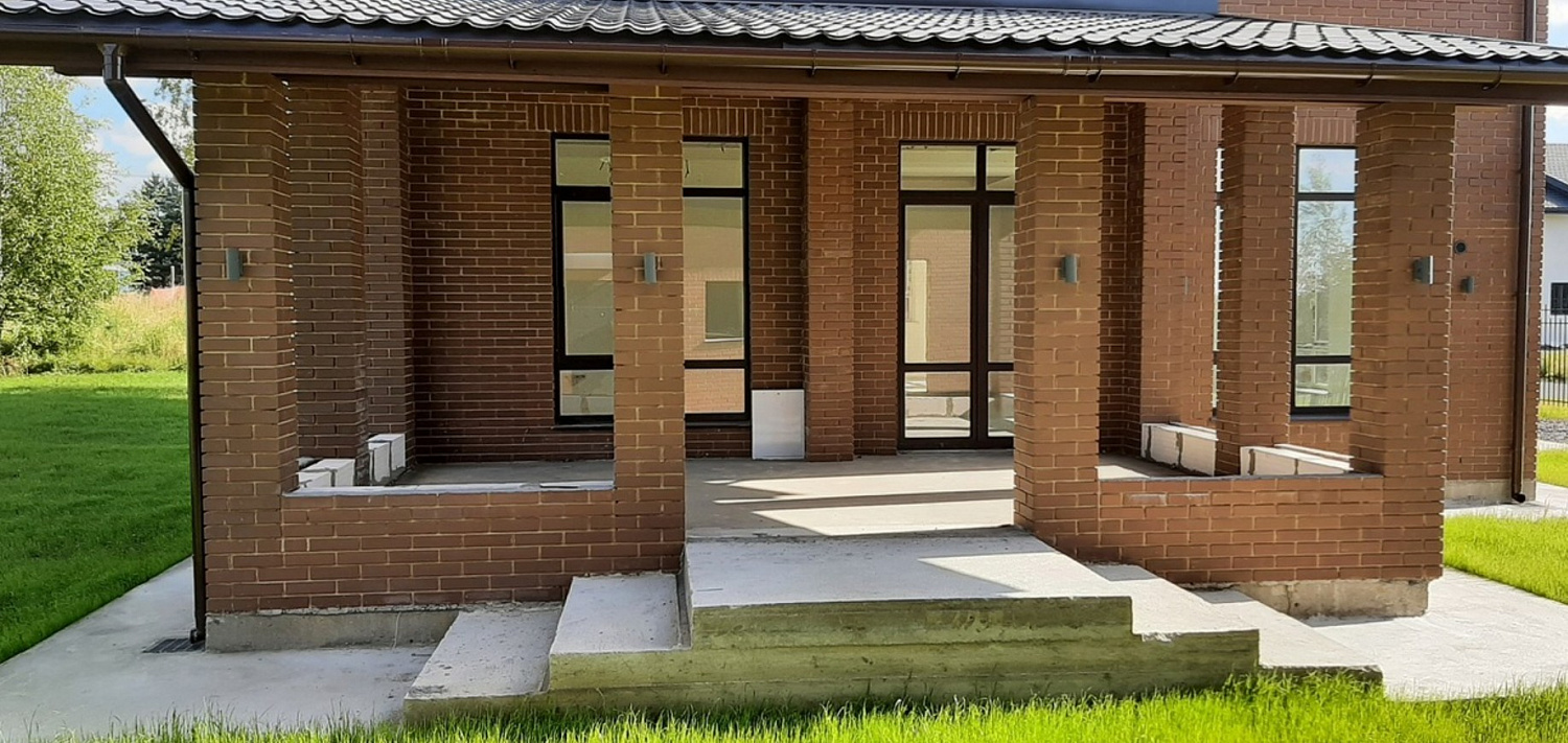 Каменный дом в классическом стиле