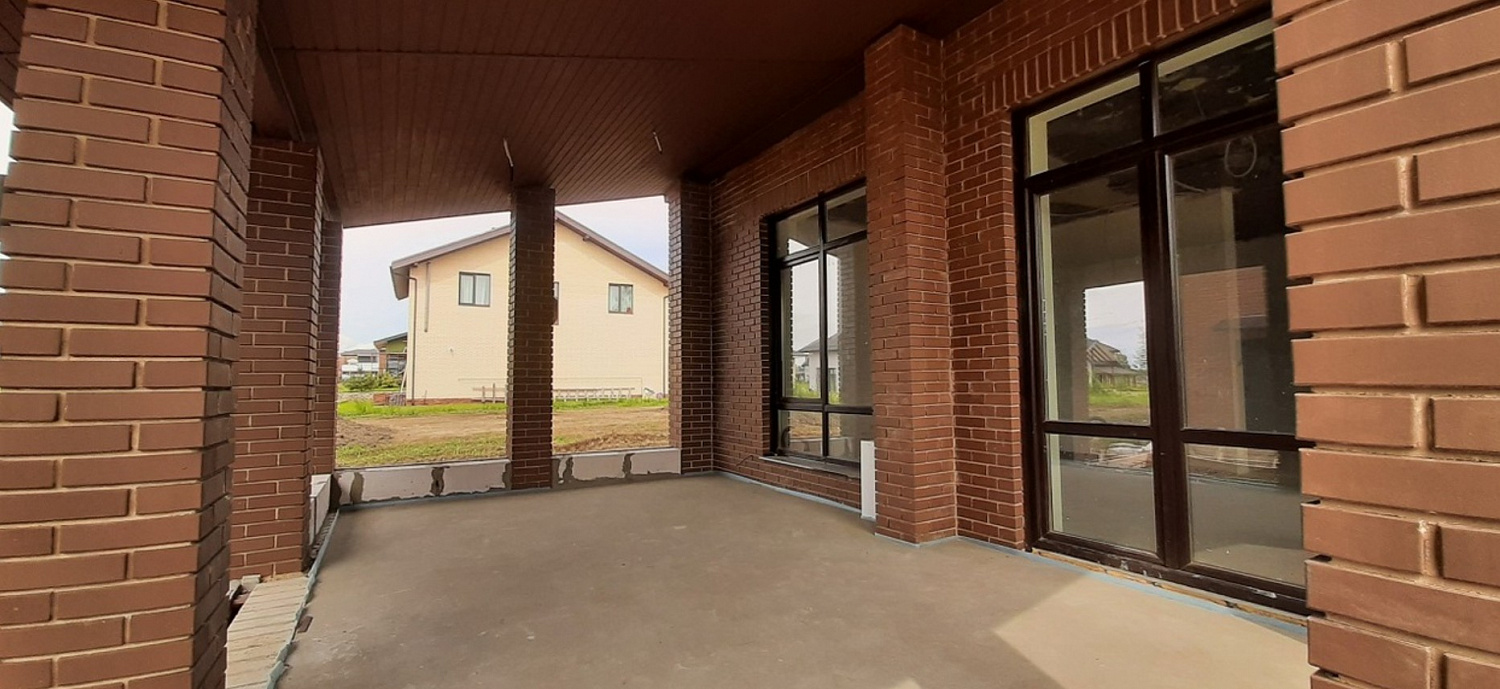 Каменный дом в классическом стиле